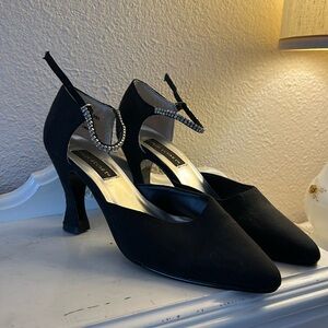 Fancy little black pumps with rhinestones around the ankle straps